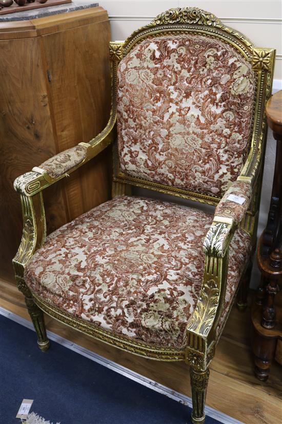 A pair of Louis XVI style giltwood fauteuils